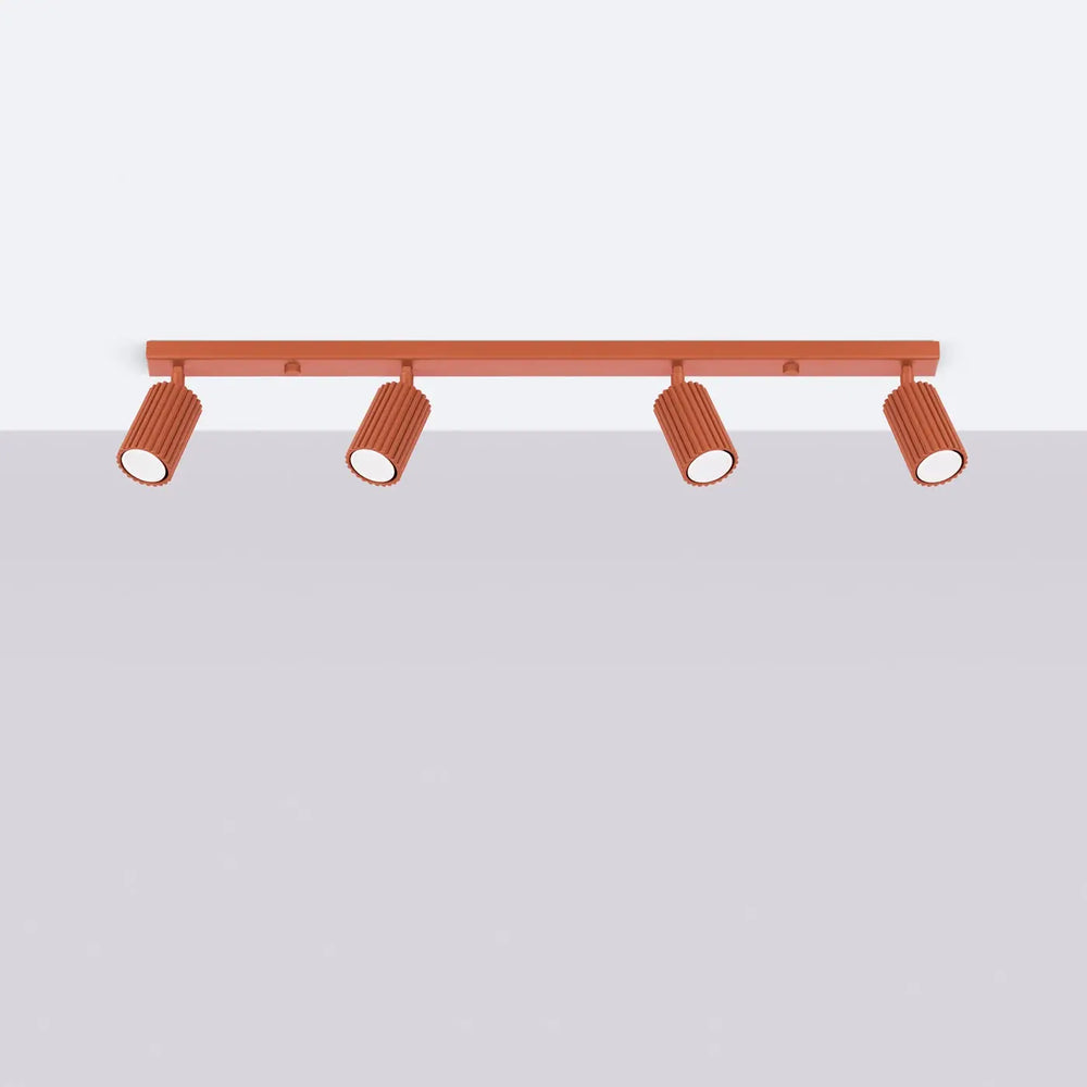 Plafonnier karbon allie en cuivre avec quatre spots cylindriques rainurés et ampoules gu10 interchangeables style minimalisme
