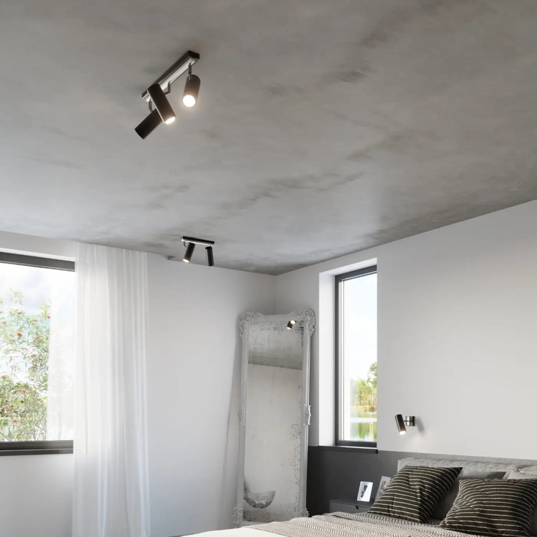 Luminaire plafonnier direzione 1 noir avec spots orientables pour éclairage élégant sur plafond minimaliste texturé