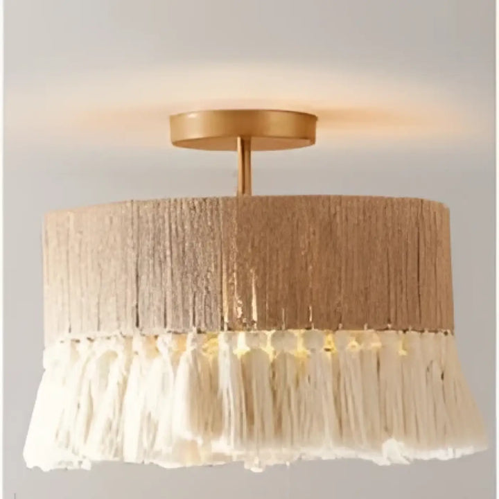 Luminaire plafonnier lunara beige en tissu naturel avec pampilles tressées et ferrures dorées charme bohème