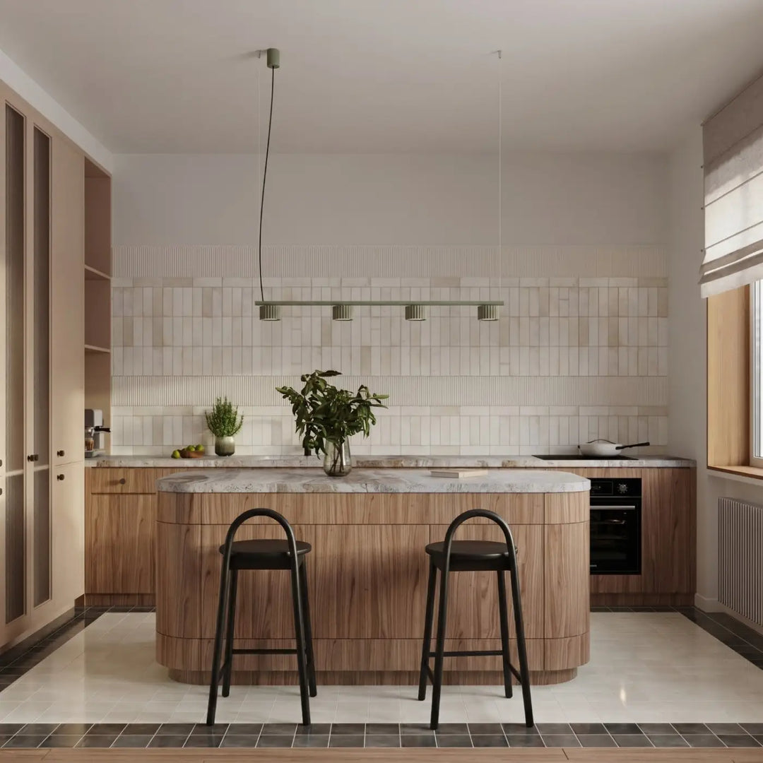 Lustre vert olive au-dessus d'un îlot de cuisine