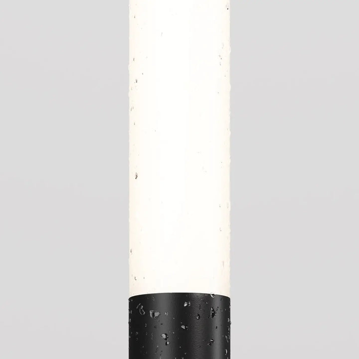 Luminaire extérieur flare avec piquet lumineux en aluminium noir et tige fine design moderne blanc translucide et noir mat