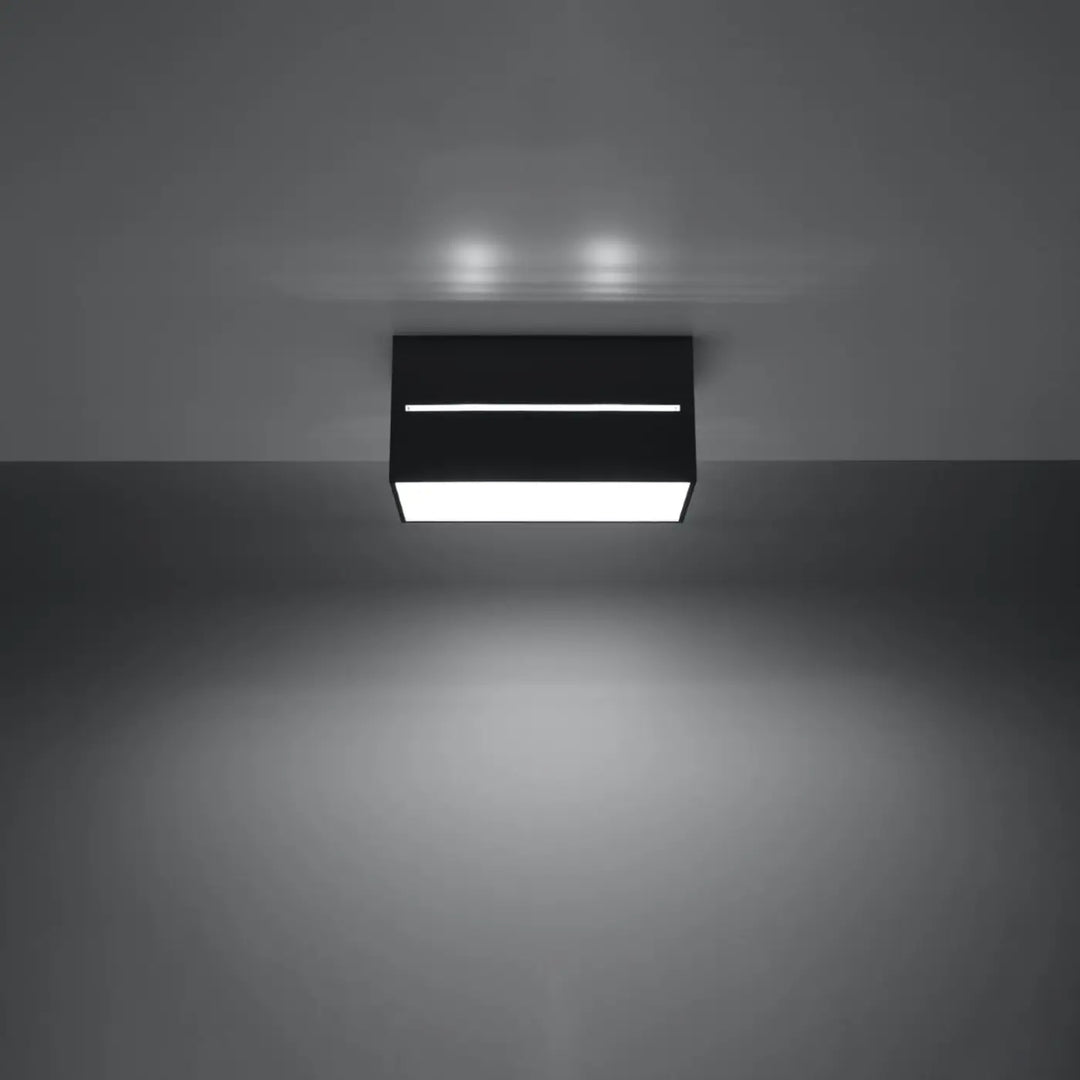 Luminaire plafonnier noir allumé