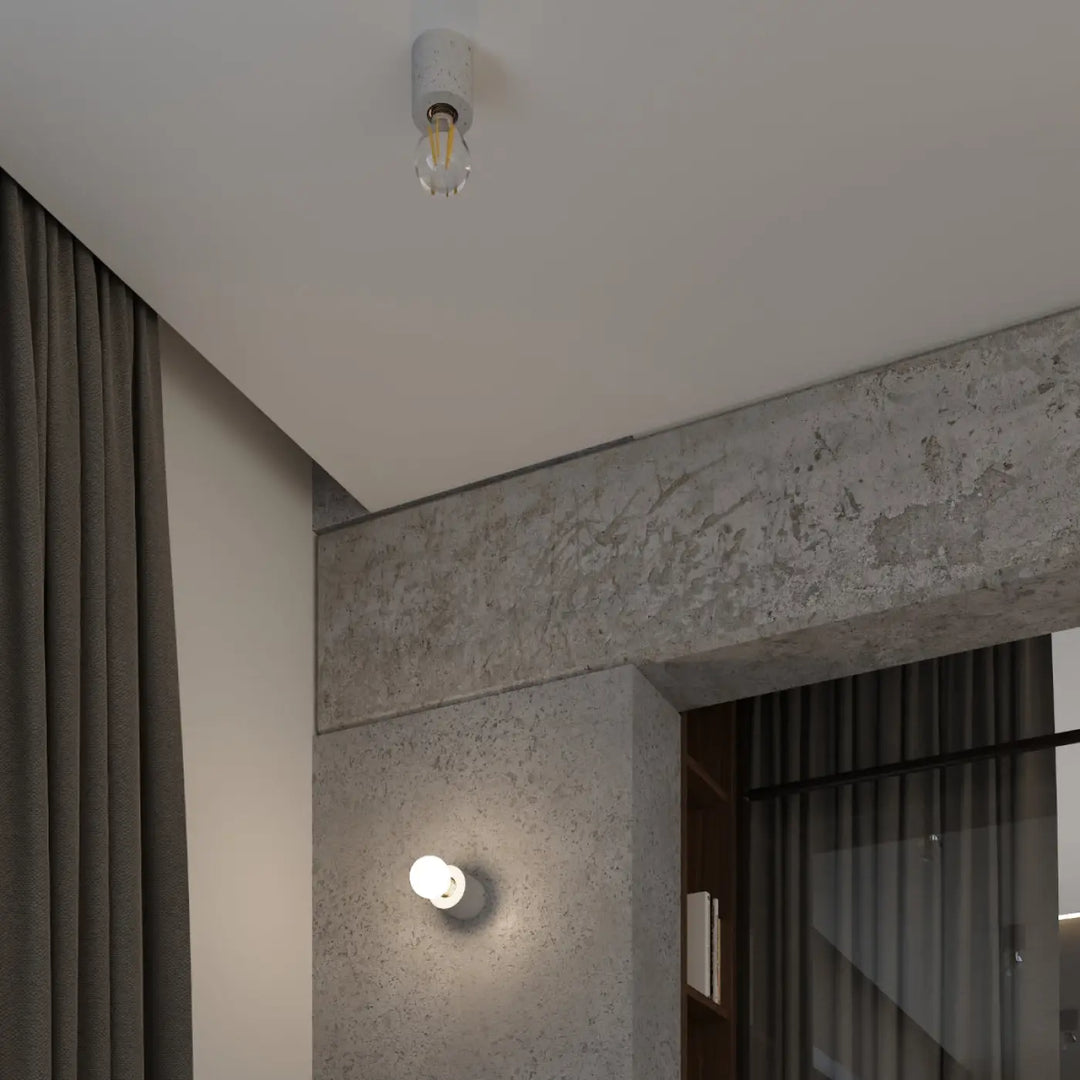 Applique murale salgado en béton avec ampoule à filament visible pour un style loft minimaliste moderne