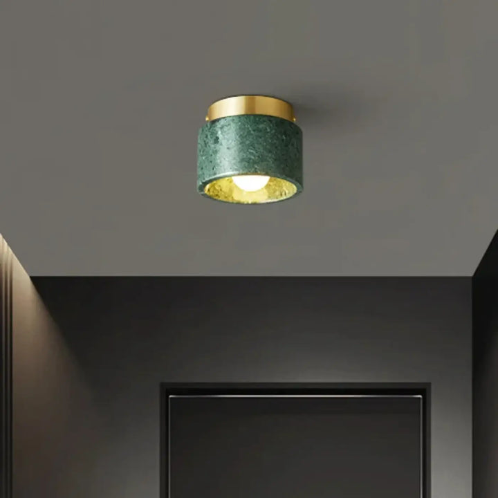 Plafonnier cylindrique en marbre et finition laiton moderne