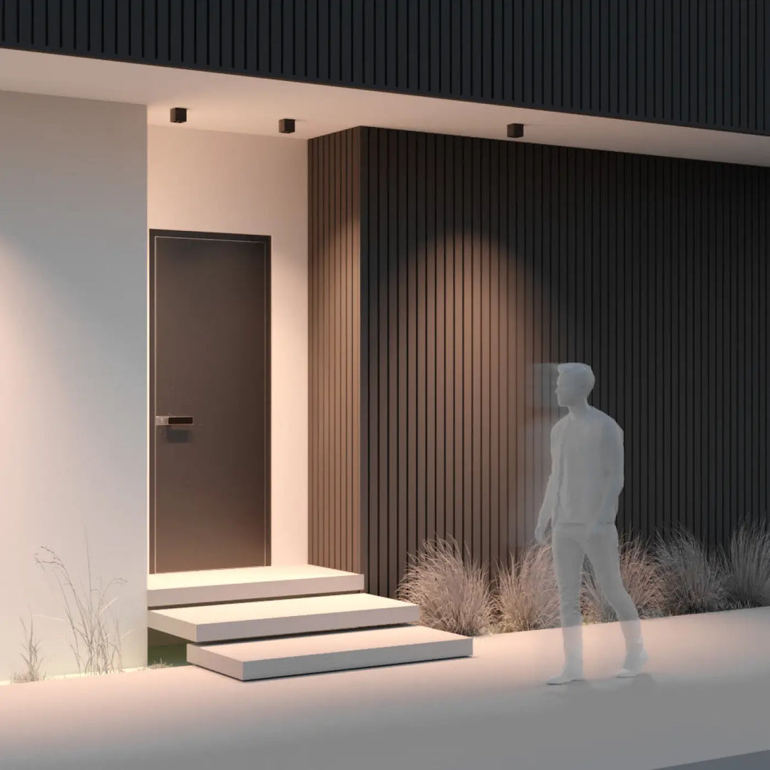 Luminaire extérieur ares avec porte avant gris graphite mat en métal et poignée horizontale minimaliste long d’une galerie