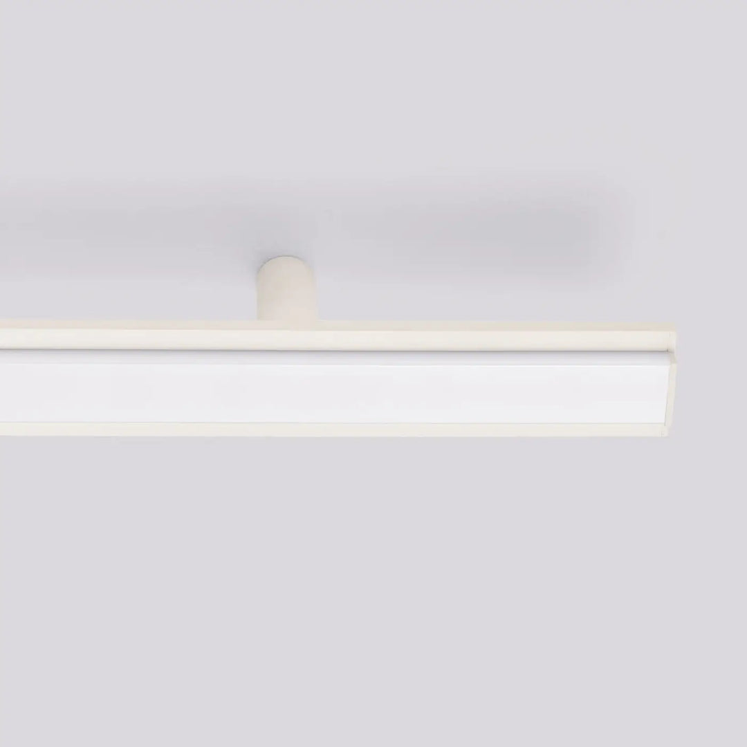 Plafonnier linéaire LAGOM beige éteinte, détail de la fixation
