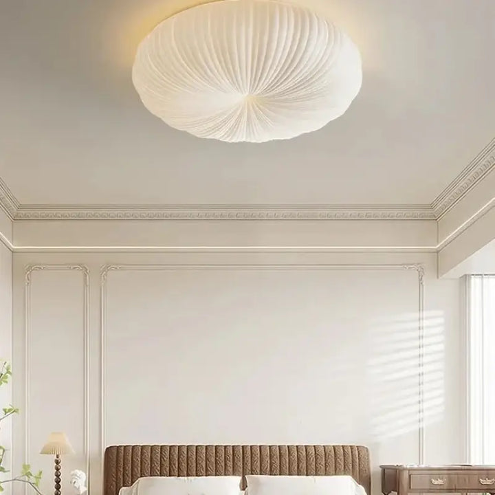 Plafonnier moderne en verre blanc à effet lumineux et au style épuré