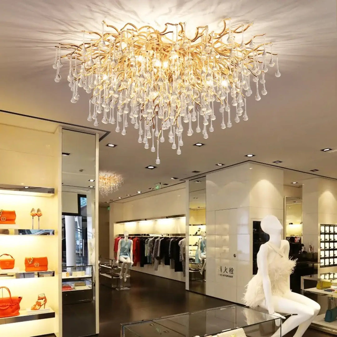 Plafonnier raffiné ramora en branchages dorés avec cristaux suspendus pour un éclairage élégant et luxueux