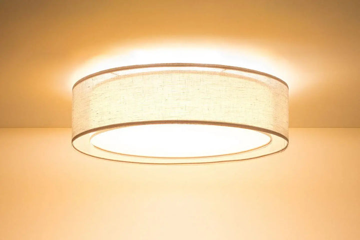 Plafonnier rond beige avec abat-jour en tissu beige doux et bordure métallique fine luminaire plafonnier puro