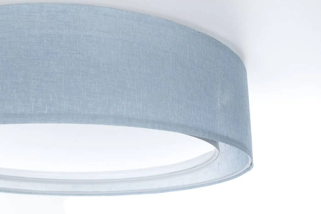 Plafonnier rond bleu clair avec abat-jour cylindrique en lin texture légère pour luminaire plafond puro
