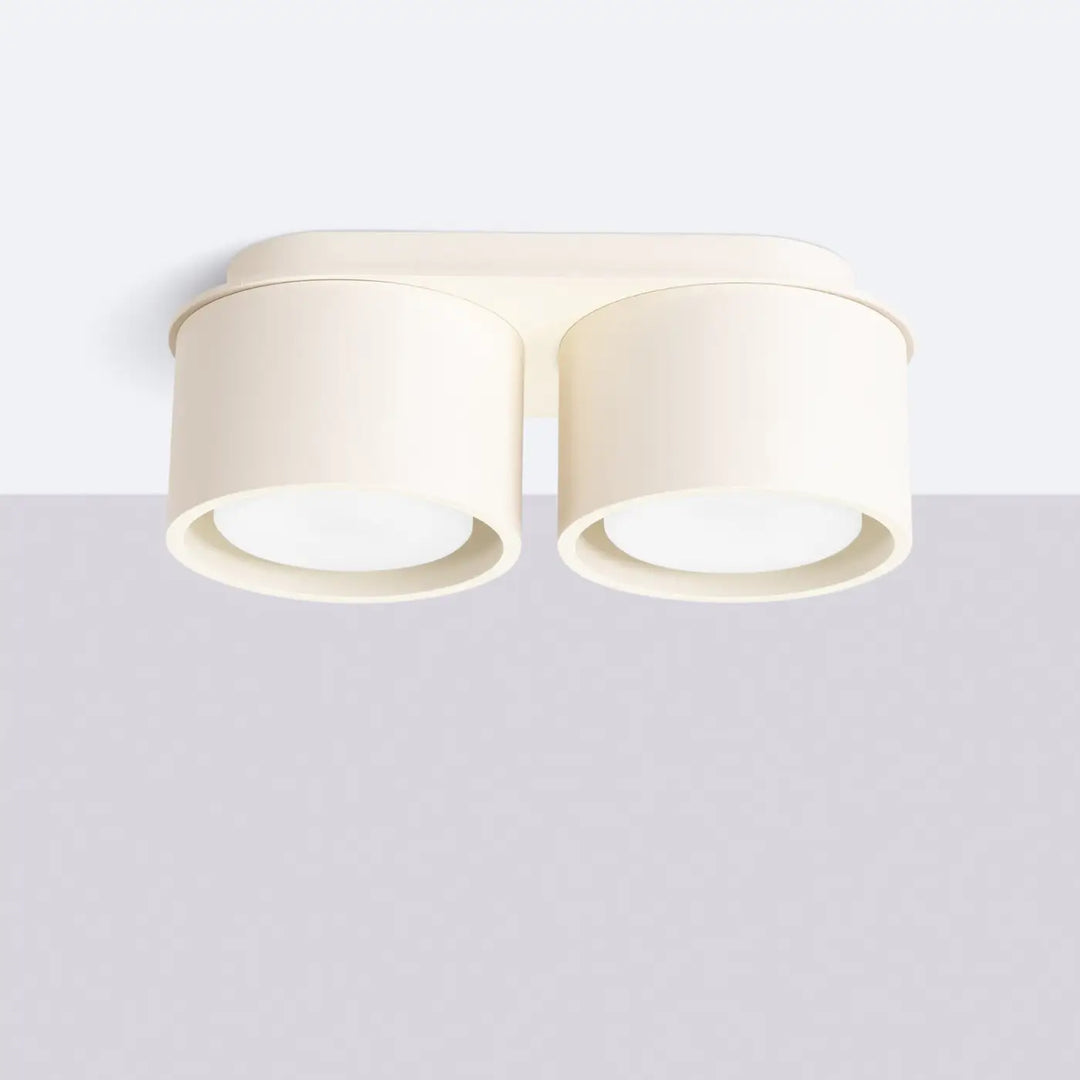 Plafonnier rond plat beige éteint, vue rapprochée
