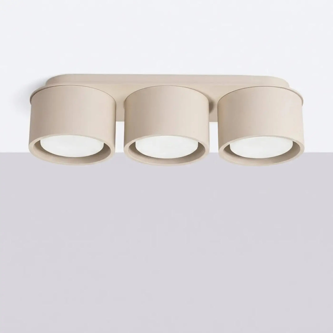 Plafonnier rond plat taupe éteint, vue rapprochée