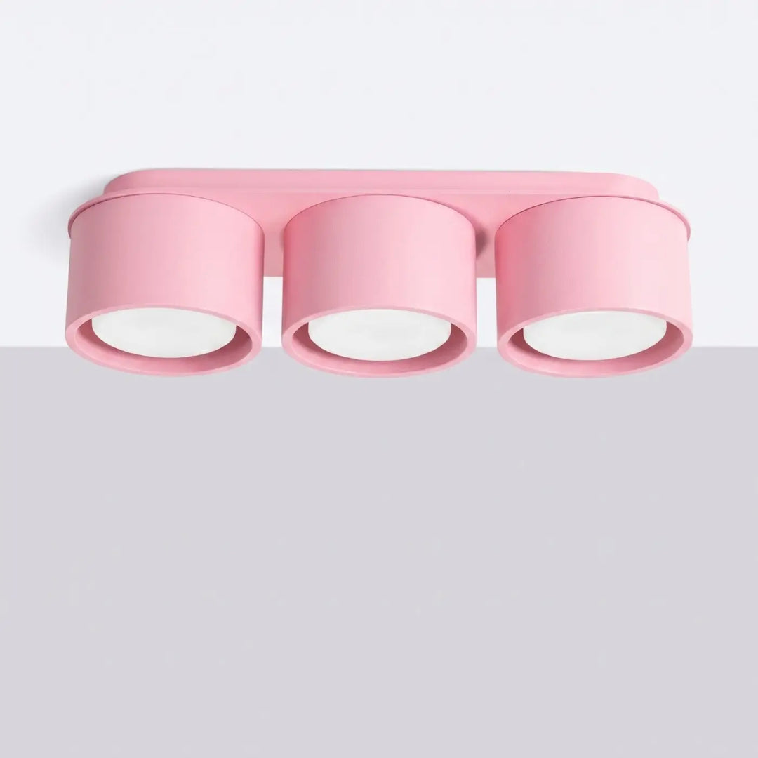 Plafonnier rond plat rose éteint, vue rapprochée