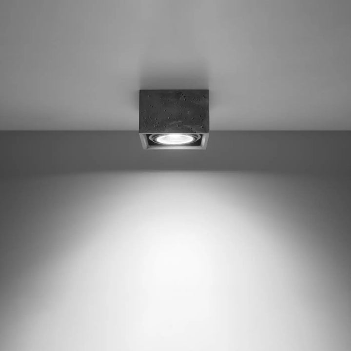 Luminaire plafonnier gris allumé