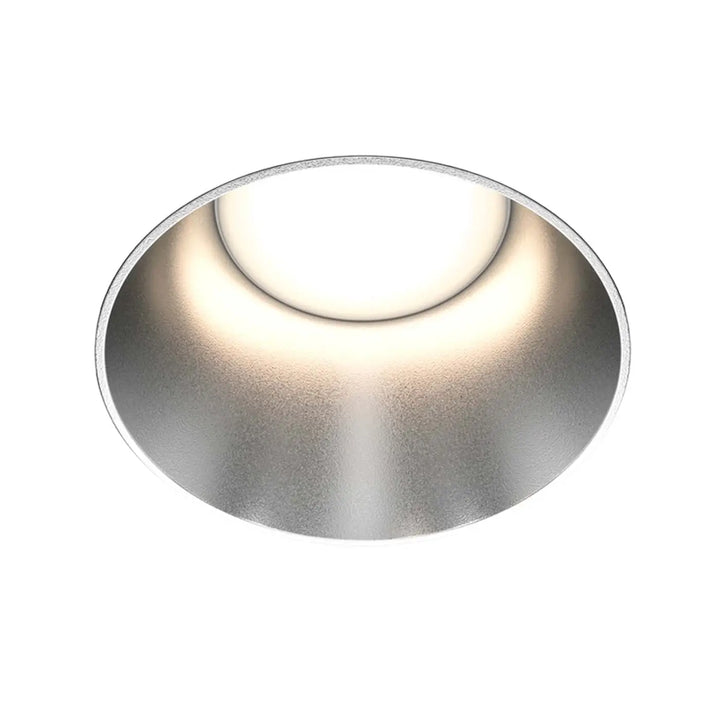 Spot share encastré rond en acier finition argentée avec collerette visible et ampoule led circulaire au centre style art déco