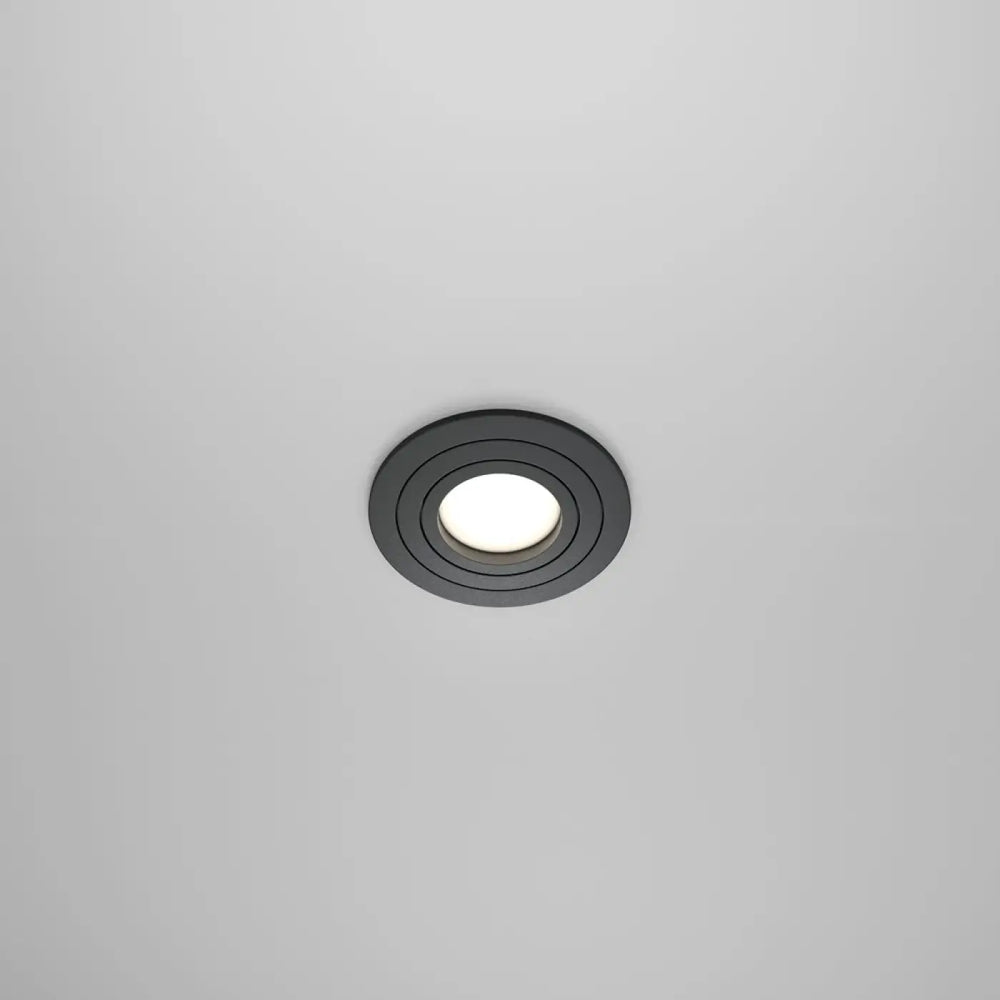 Spot encastrable rond noir avec ampoule gu10 orientable et centre lumineux blanc pour éclairage intérieur