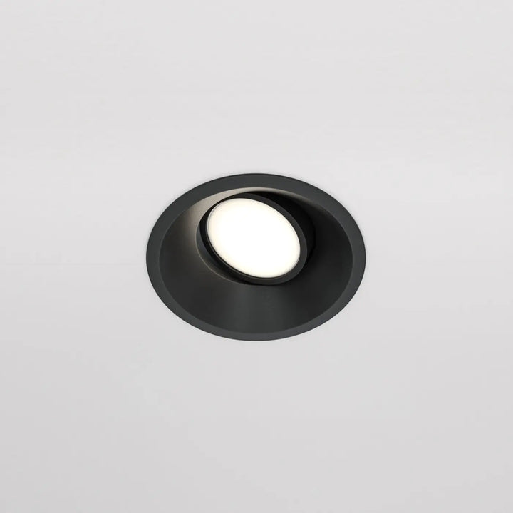 Spot encastrable dot rond avec lumière blanche éclatante au centre et design ovale noir moderne pour plafond