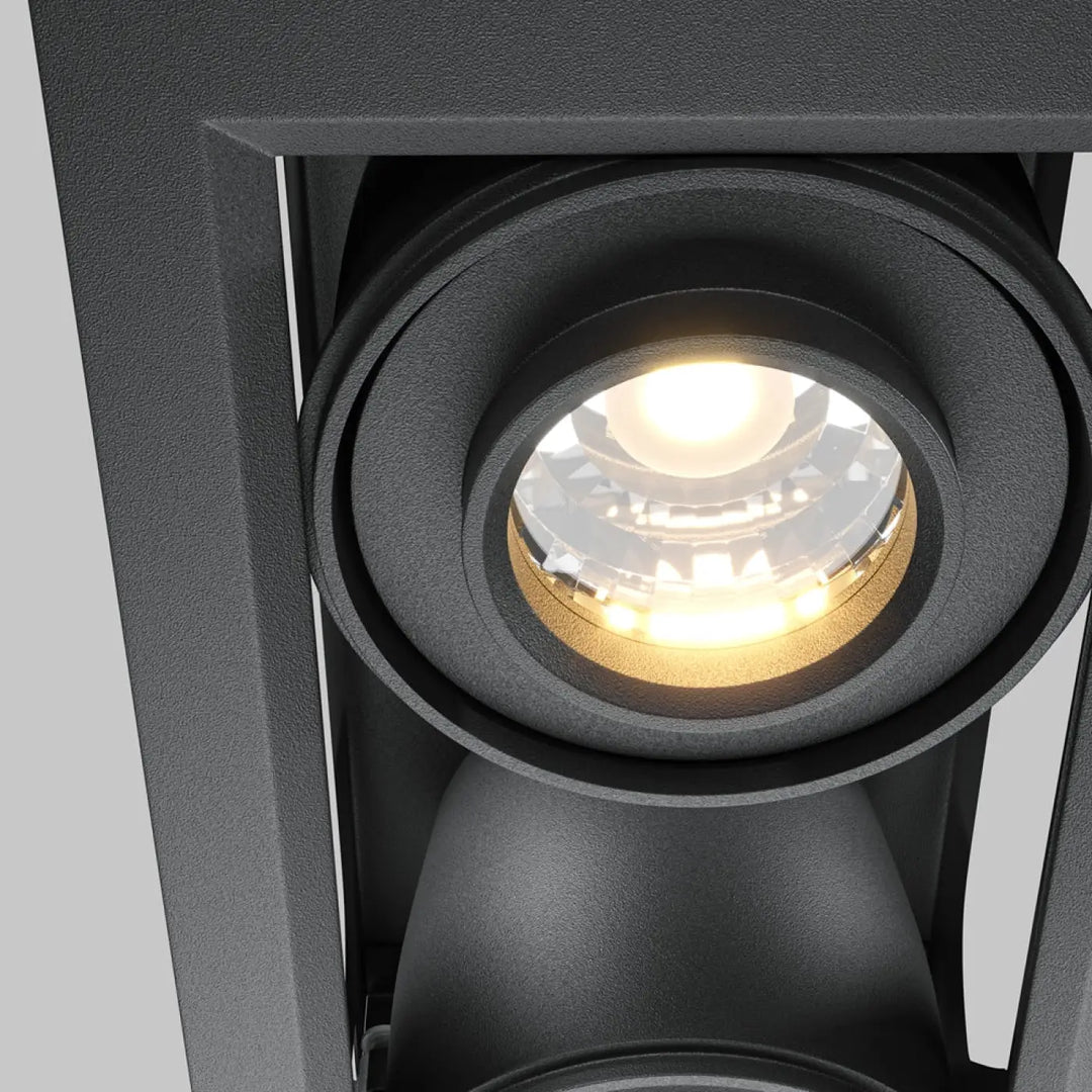 Spot metal modern double led en métal finition mate noire avec lentille facettée claire et ampoule led blanc chaud