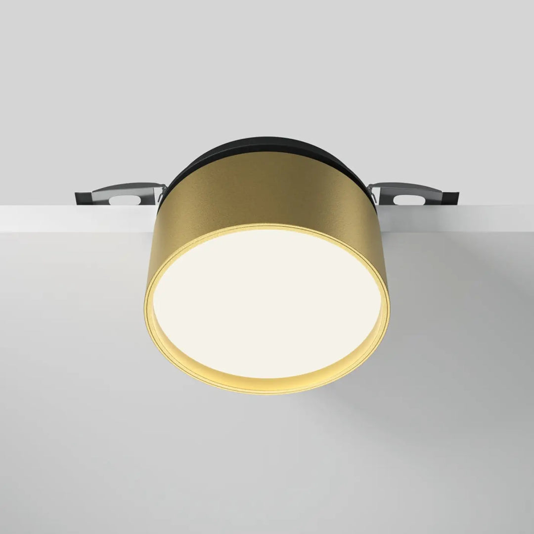 Spot onda led rétractable encastrable cylindrique finition or avec anneau noir et supports métalliques dim to warm