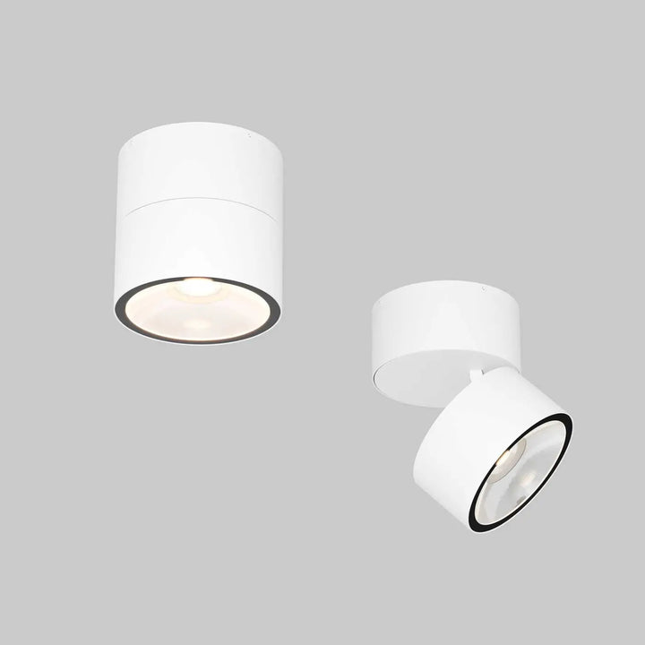Spot spin led orientable blanc cylindrique avec bague noire et tête ajustable pour plafond intérieur