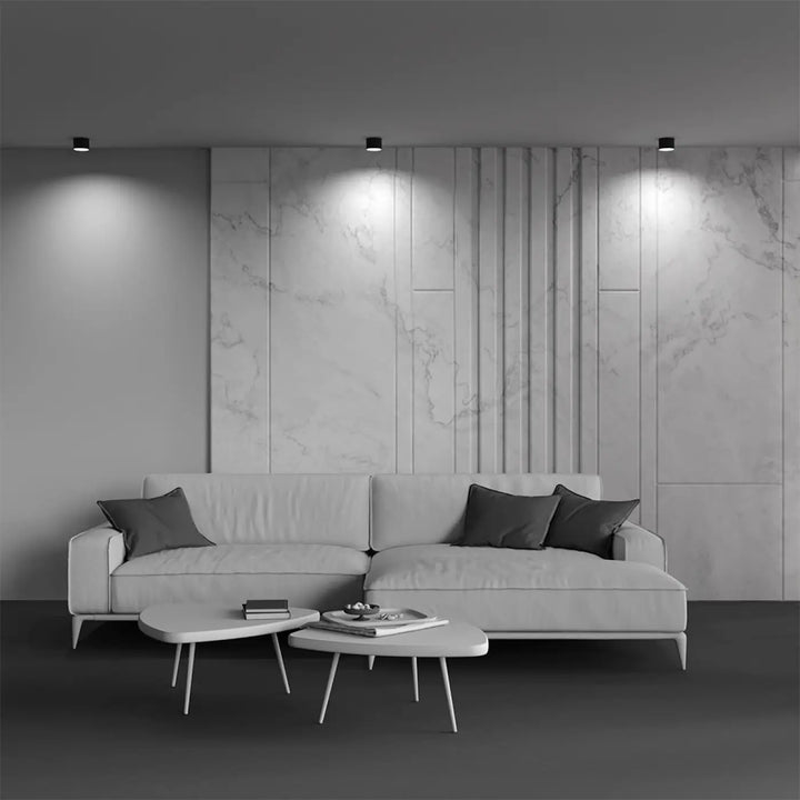 Canapé dangle en cuir blanc moderne spot vega avec coussins gris foncé et led intégrée spot led