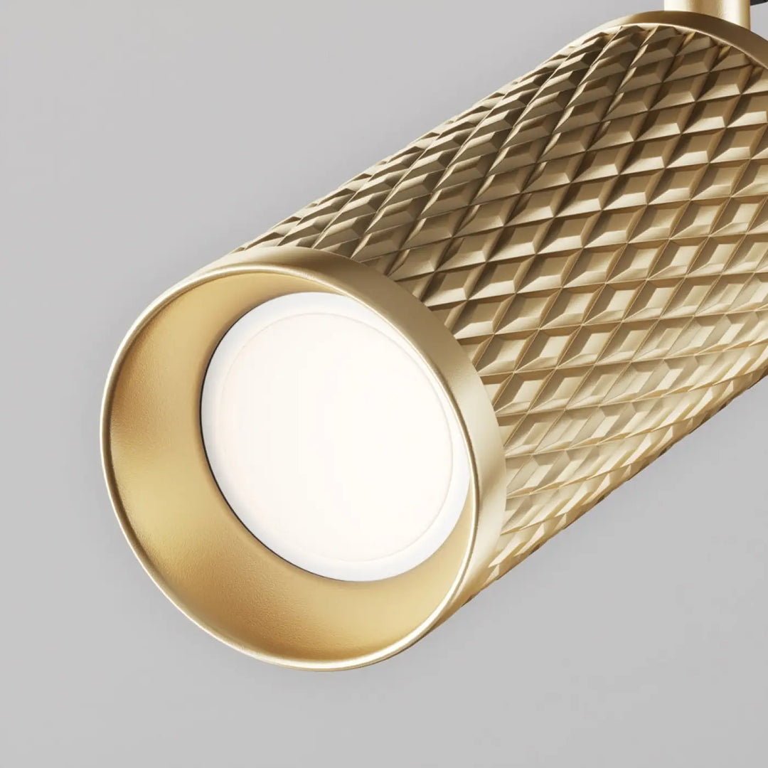 Spot orientable focus design en or avec tête texturée diamantée et ampoule led blanche circulaire frontale