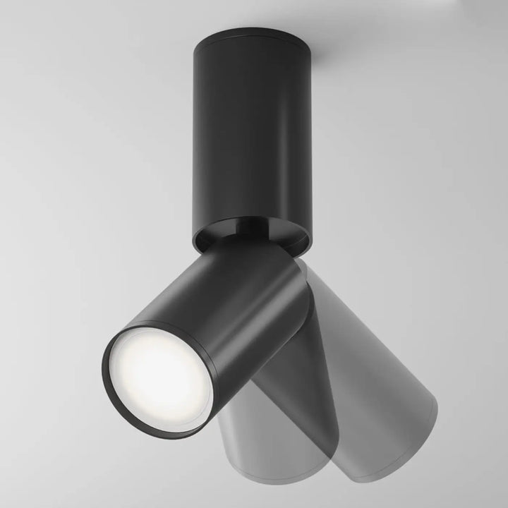 Spot orientable noir avec tête cylindrique et tige fine en métal mat pour éclairage encastré intérieur