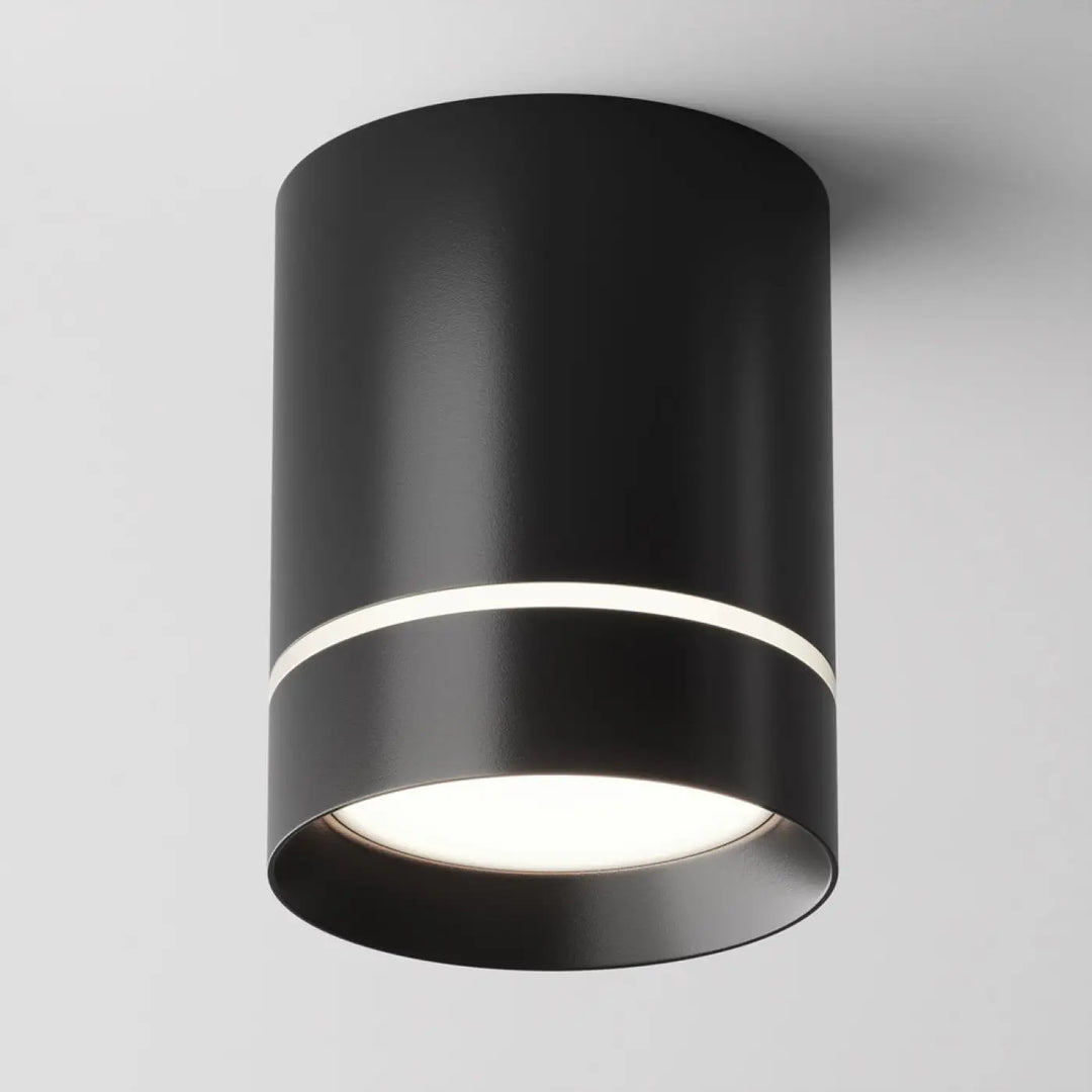 Spot orlo cylindre compact en acier noir avec finition mate et anneau blanc lumineux pour éclairage plafond