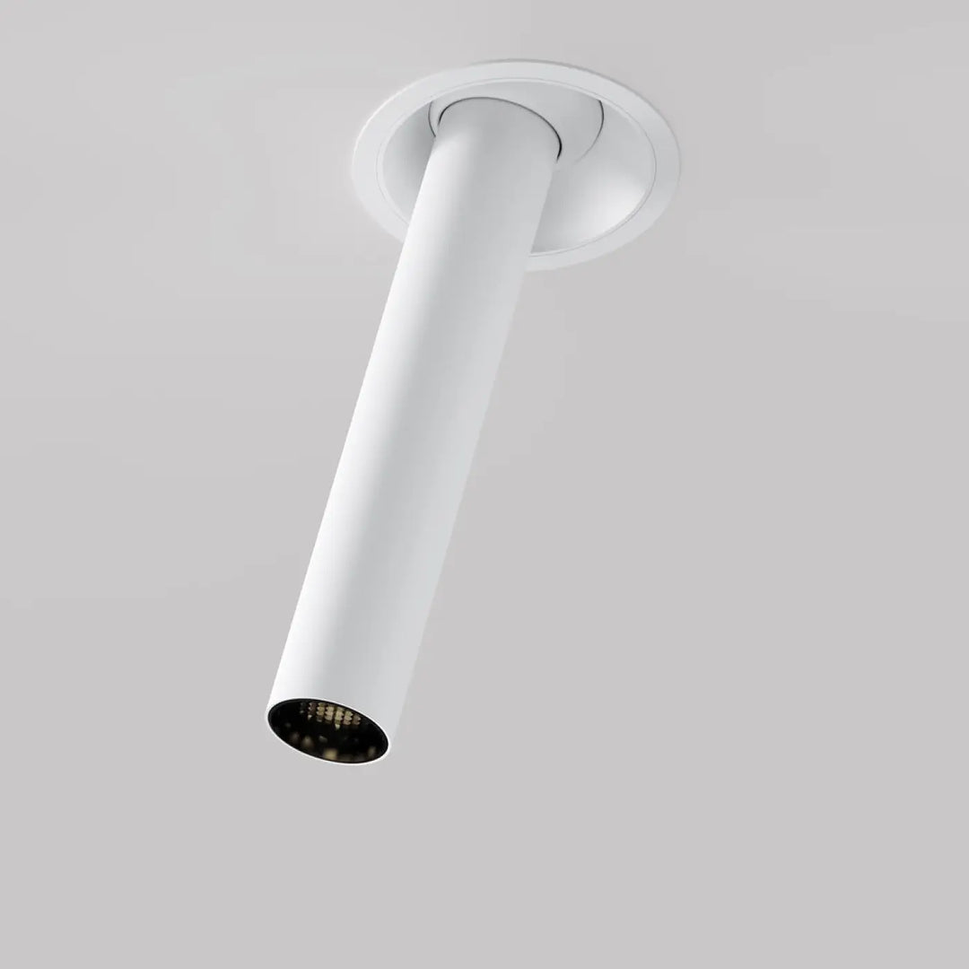 Spot focus t tube semi-encastré avec tube fin orientable blanc cylindre et intérieur sombre design moderne
