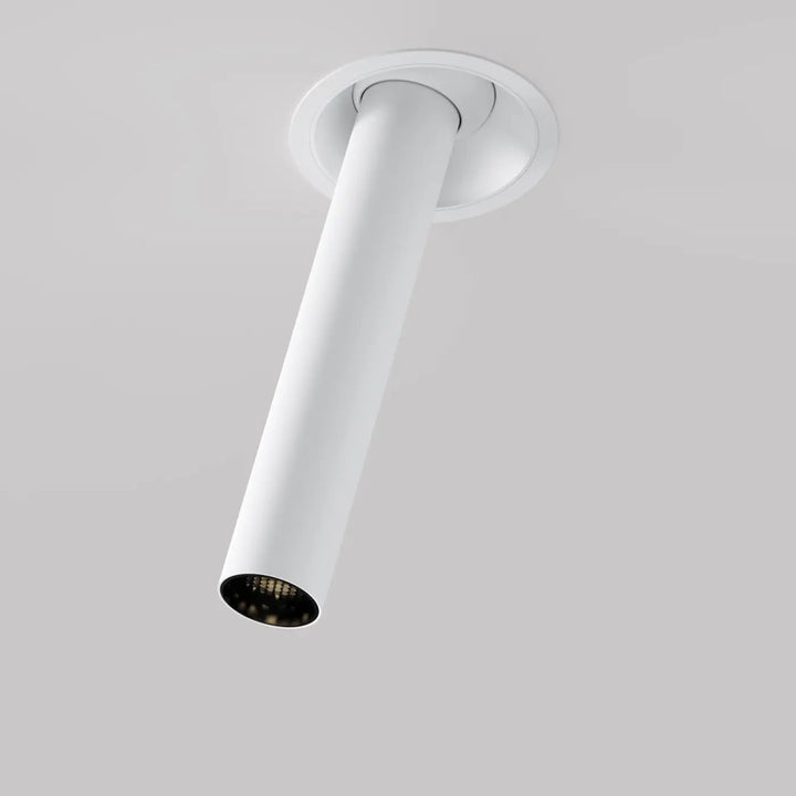 Spot focus t tube semi-encastré avec tube fin orientable blanc cylindre et intérieur sombre design moderne