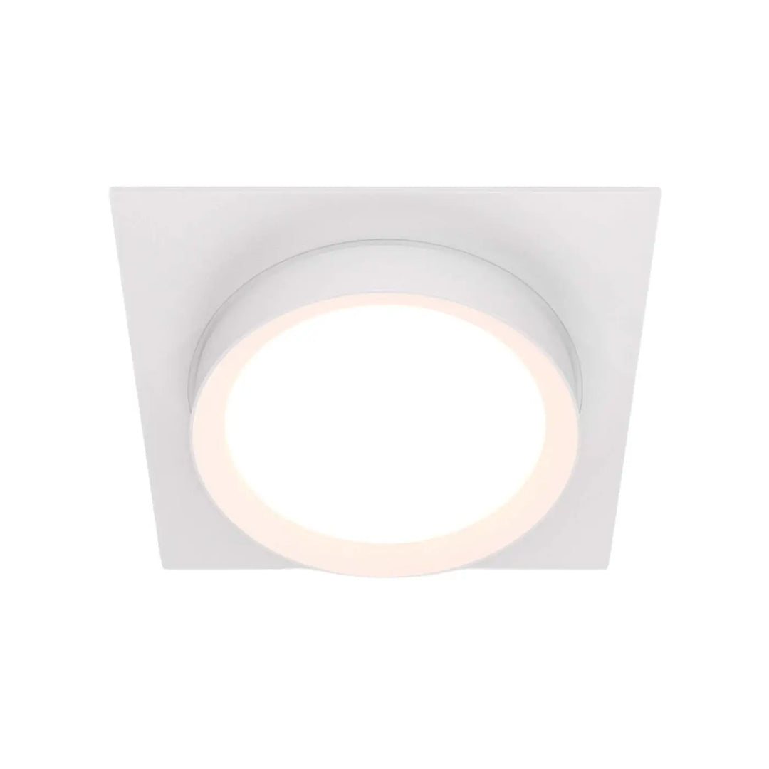 Spot semi encastré cadre carré blanc avec disque lumineux circulaire au centre pour un éclairage doux
