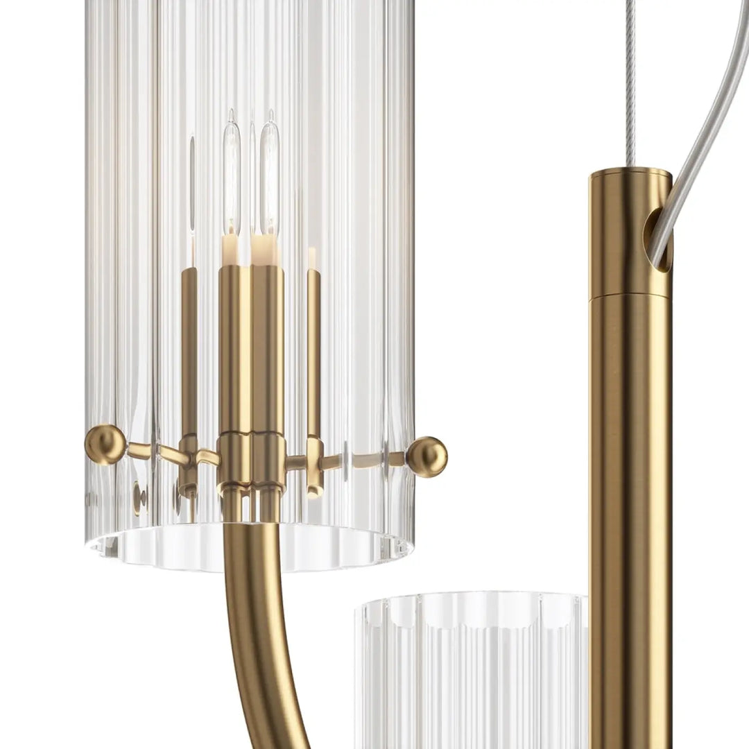 Suspension luminaire arco avec abat-jour en verre strié cylindrique et bras courbés finition laiton