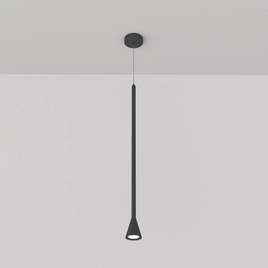 Suspension luminaire arrow noir minimaliste avec corps cylindrique et culot gu10 au-dessus d’un îlot de cuisine
