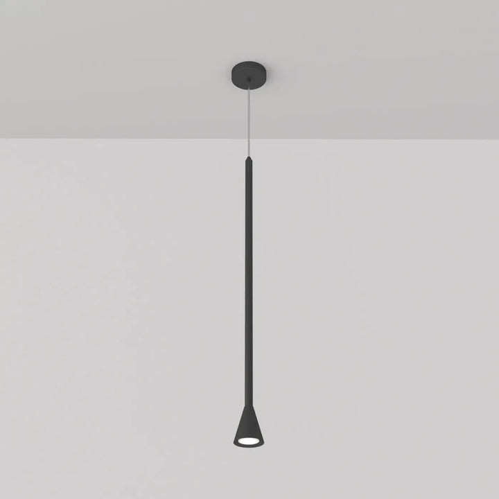 Suspension luminaire arrow noir minimaliste avec corps cylindrique et culot gu10 au-dessus d’un îlot de cuisine
