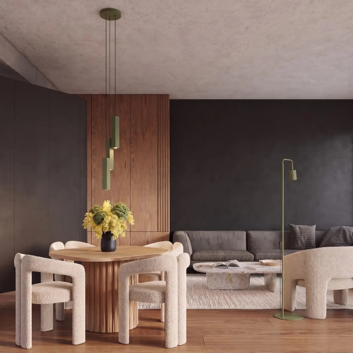Suspension Rayo vert olive en ligne à 3 tubes cannelés au-dessus d'une table à manger