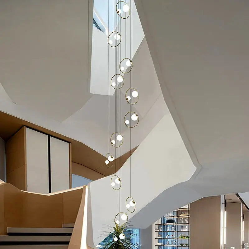 Suspension Cascade LED Moderne Avec Sphères Ajourées Chic Doré