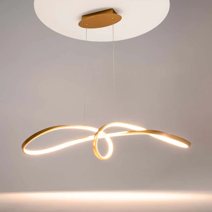 Suspension luminaire curve avec design nœud infini en aluminium noir et finition dorée éclat chaud contemporain