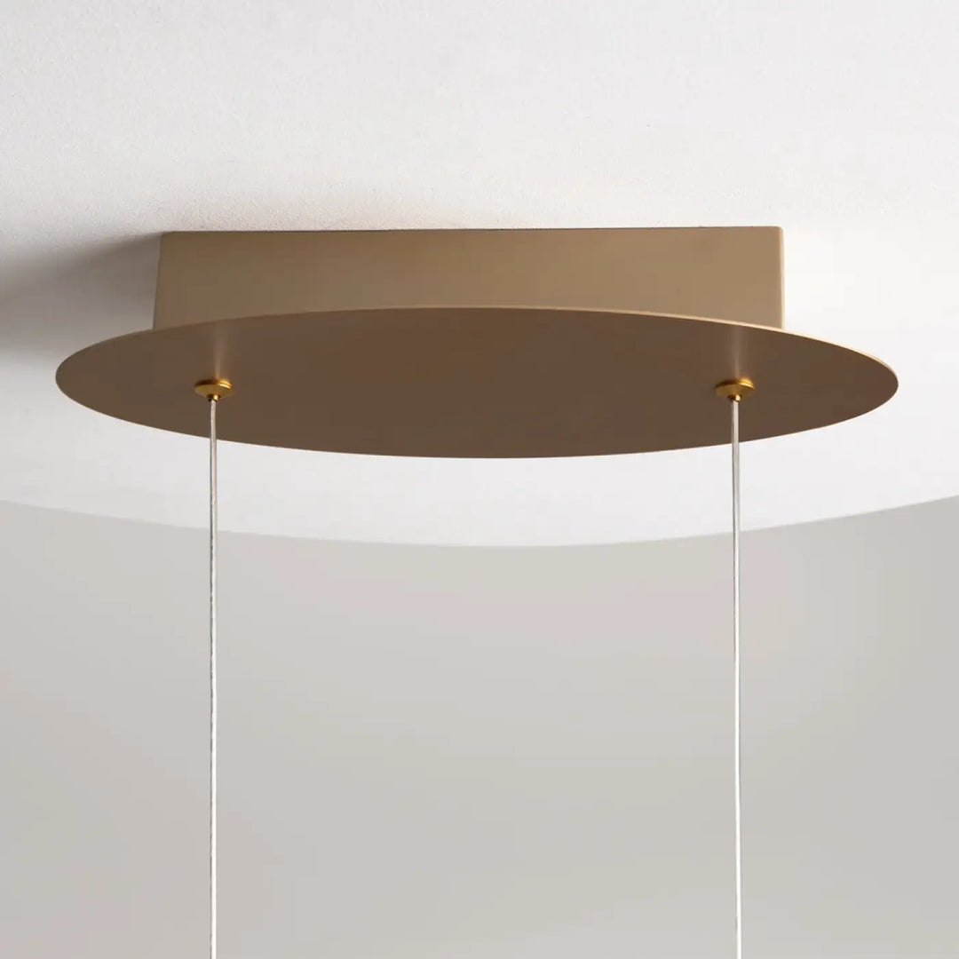Suspension luminaire curve nœud infini avec plaque rectangulaire or mat et disque circulaire en aluminium noir suspendu