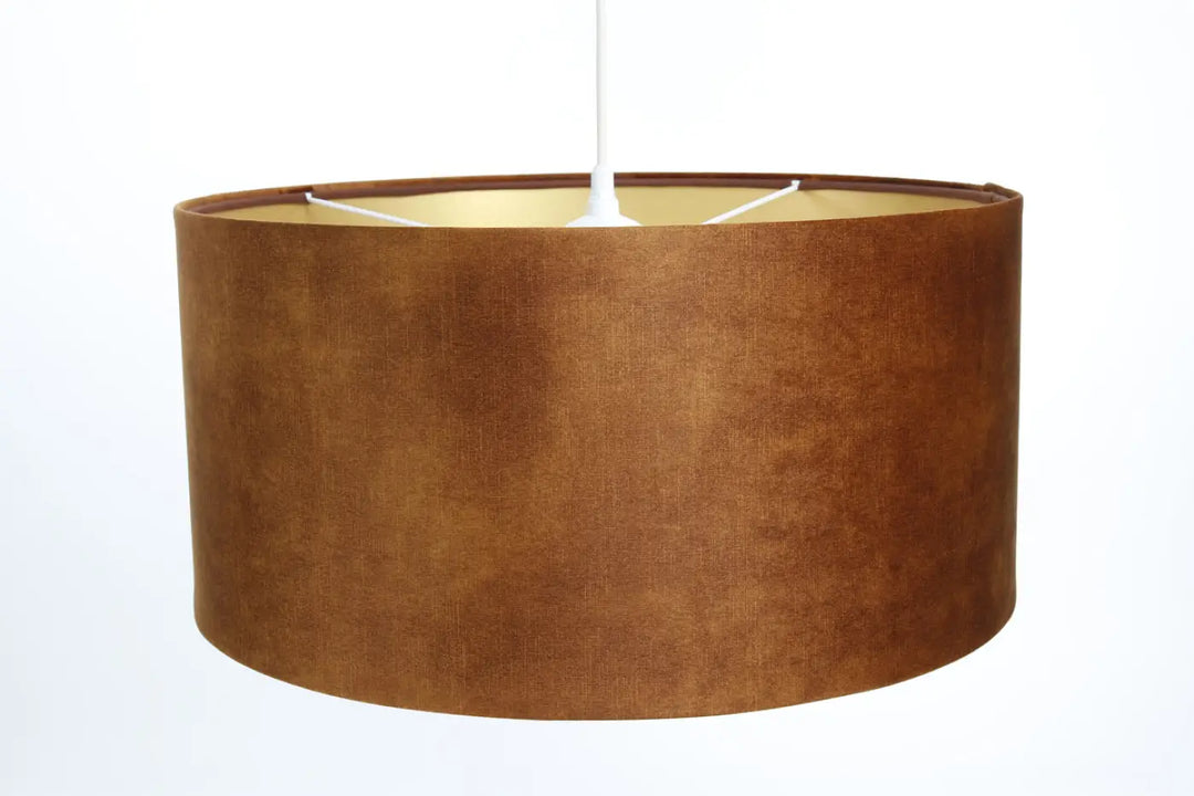 Suspension cylindrique caramel en cuir synthétique avec sapporte doré et intérieur doré pour luminaires décoratifs vintage glamour