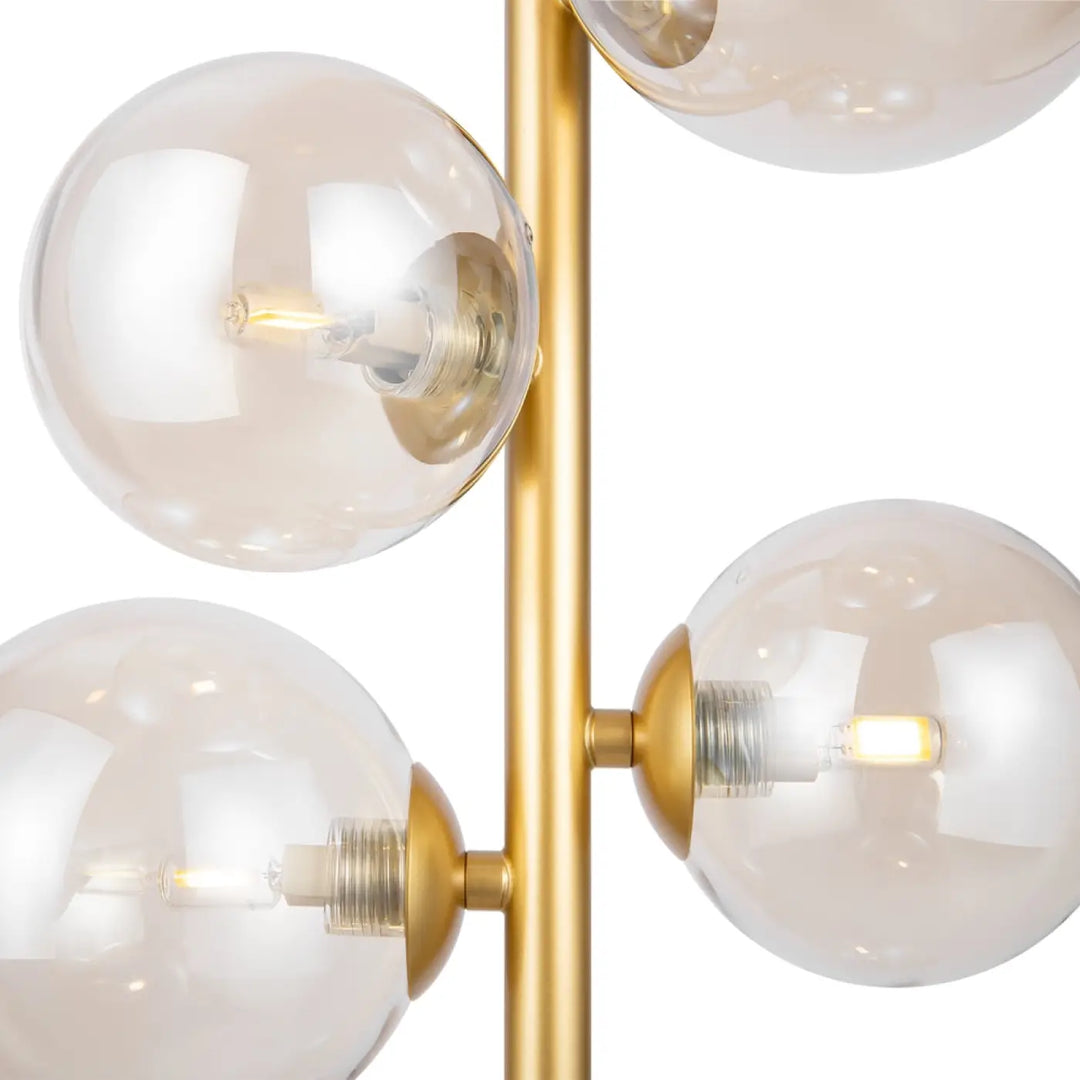 Lampadaire moderne doré dallas compacte avec quatre globes en verre et ampoules led chaudes suspension dallas