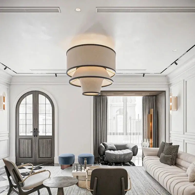 Suspension design conique en tissu beige et cerclages noirs

