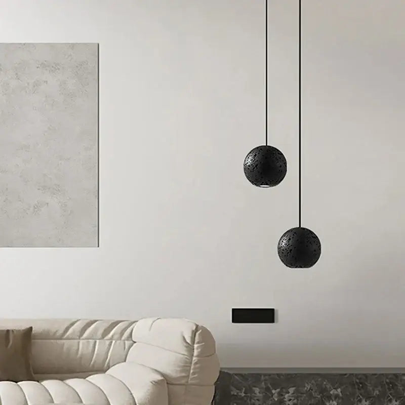 Suspension design sphère moderne éclairage noir chic