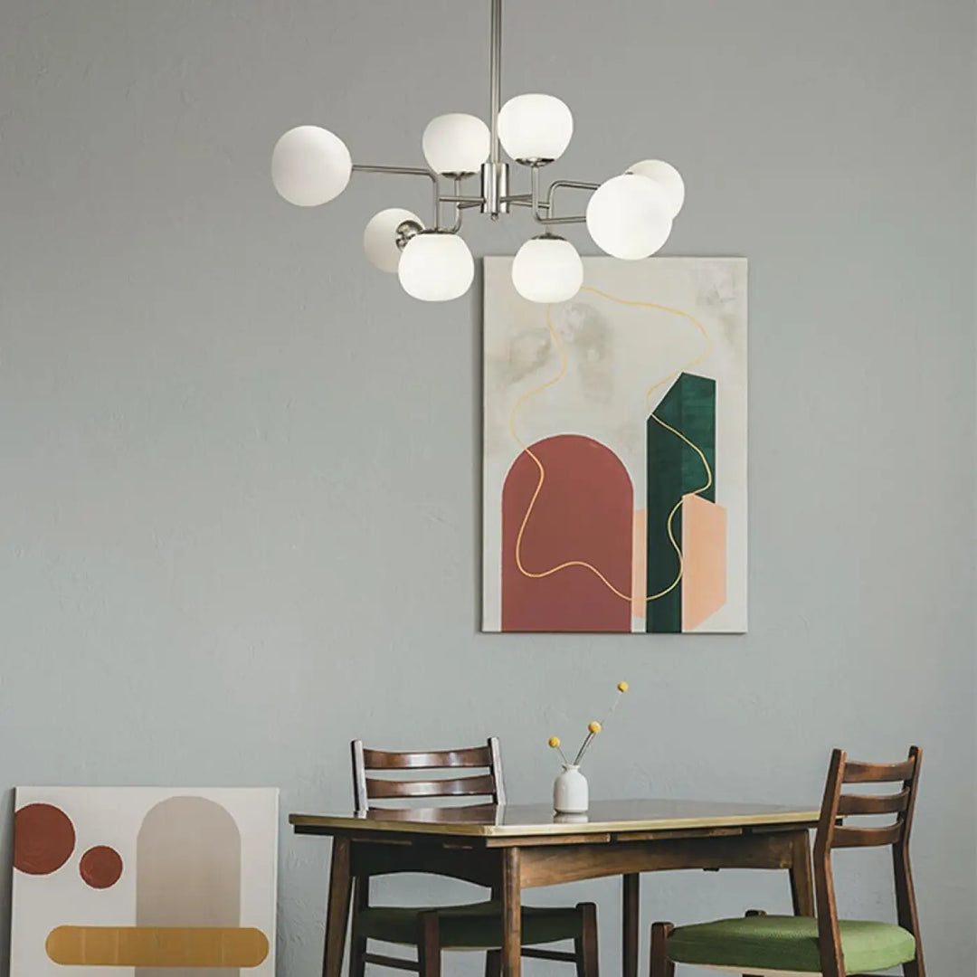 Suspension erich art déco avec plusieurs globes en verre soufflé et finition chrome pour éclairage moderne