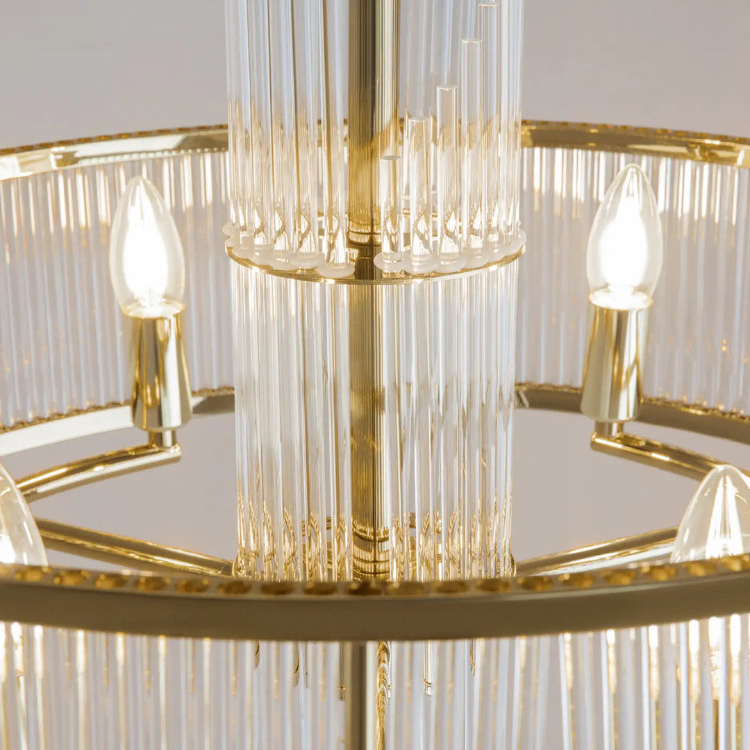 Suspension luminaire frame avec métal doré et cadres géométriques en verre clair pour un éclairage élégant