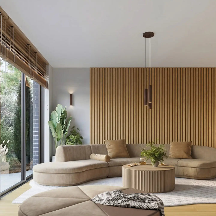 Suspension Karbon marron en grappe de 3 cylindres nervurés dans un intérieur contemporain