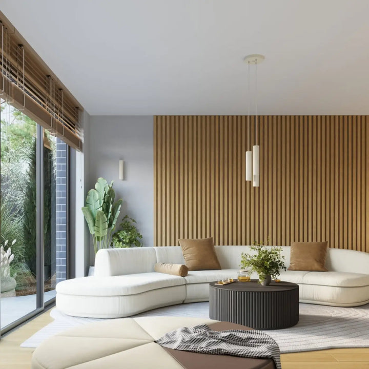 Suspension Karbon beige en grappe de 3 cylindres nervurés dans un intérieur contemporain