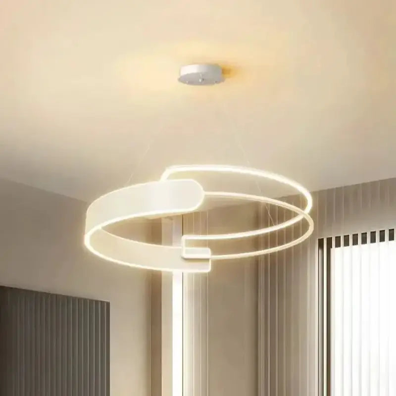 Suspension LED anneaux entrelacés design futuriste et épuré

