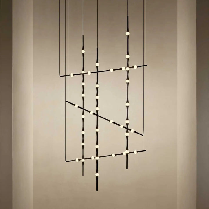 Détail des gouttes lumineuses de la suspension Dew