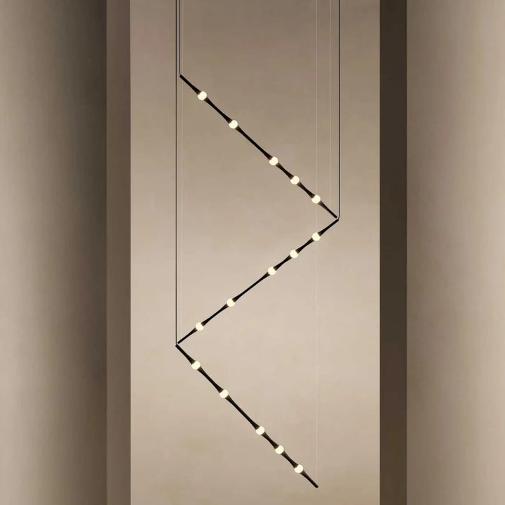Détail de la structure en aluminium noir de la suspension Dew
