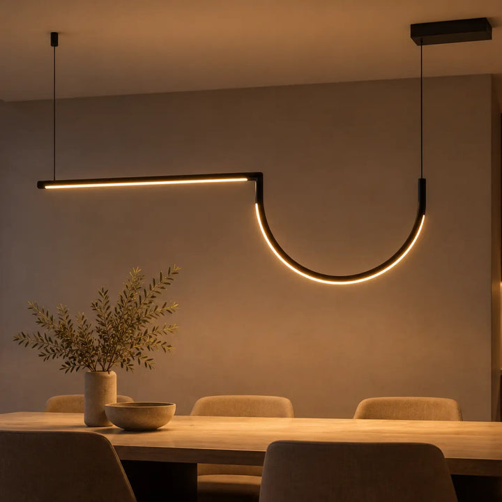 Suspension tubs modular en aluminium noir avec mini rosace encastrée design minimaliste et lumière ambiante chaude